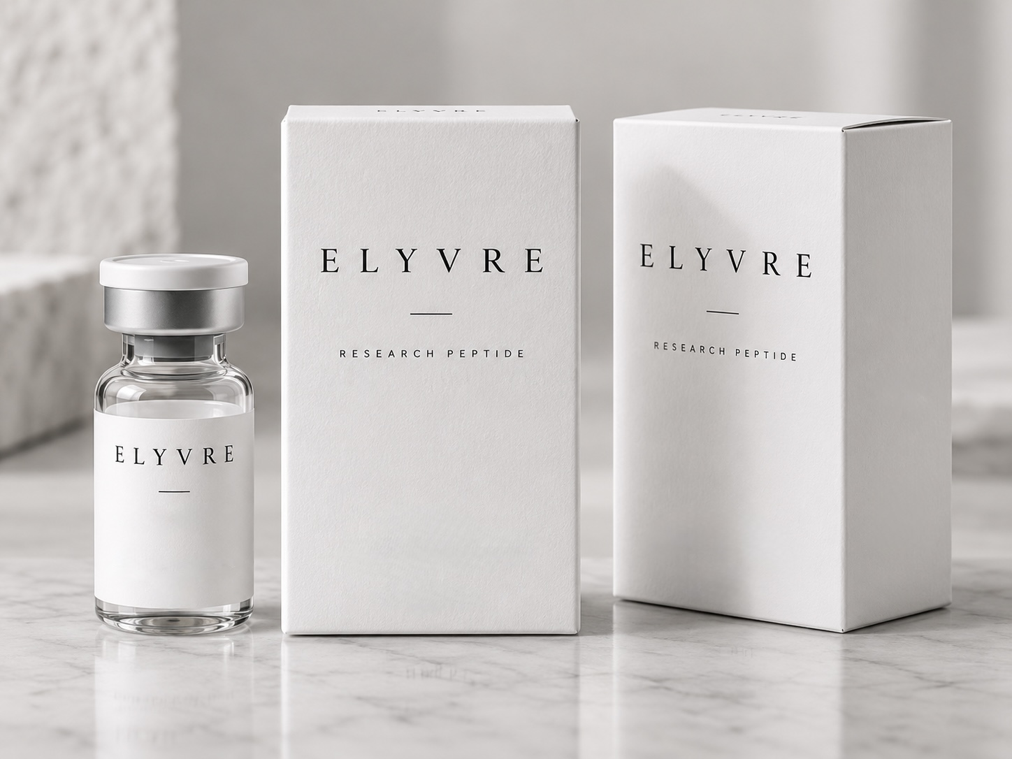 Elyvre Umverpackung und Vial auf Marmor